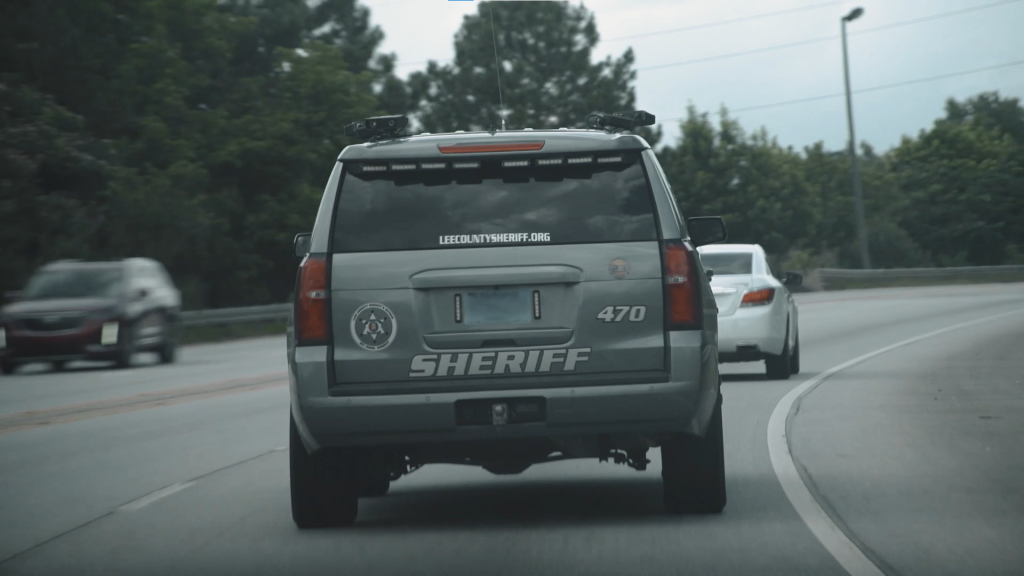 Lee County Sheriff's Patrol Vehicle is on its way to investigate a homicide crime scene.