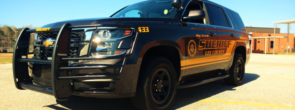 A Lee County Police Officer's Patrol Vehicle used to investigate a homicide crime scene.